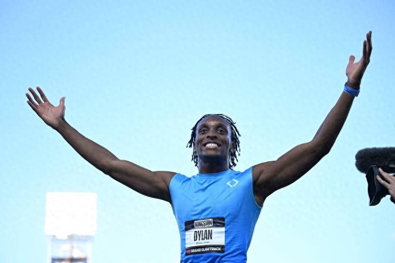 A retail worker defeats an Olympic champion, claiming victory in the men&#39;s 110m hurdles at the World Athletics Golden Grand Prix.