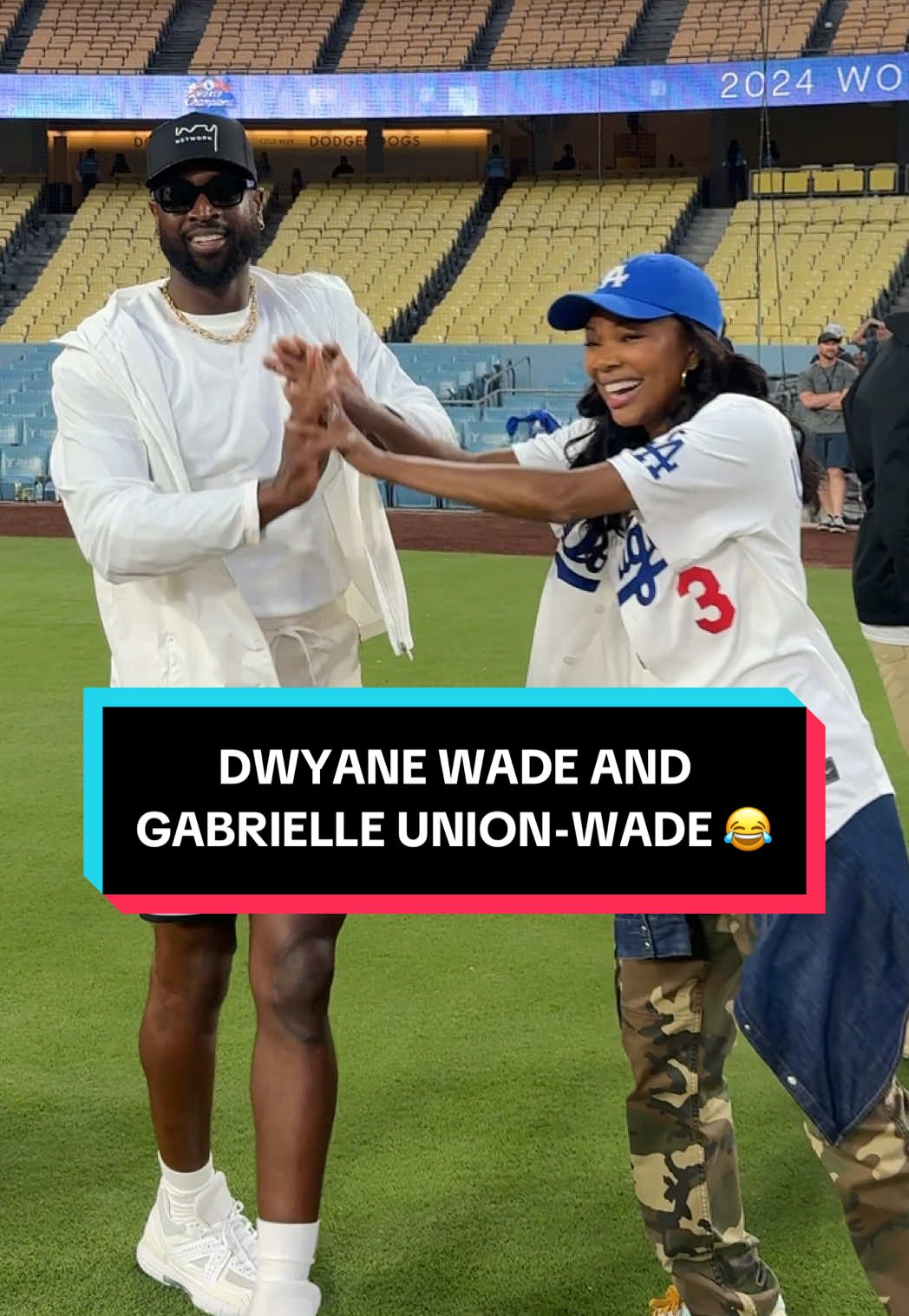 @Dwyane Wade and @Gab Union having fun on the field. 😂 